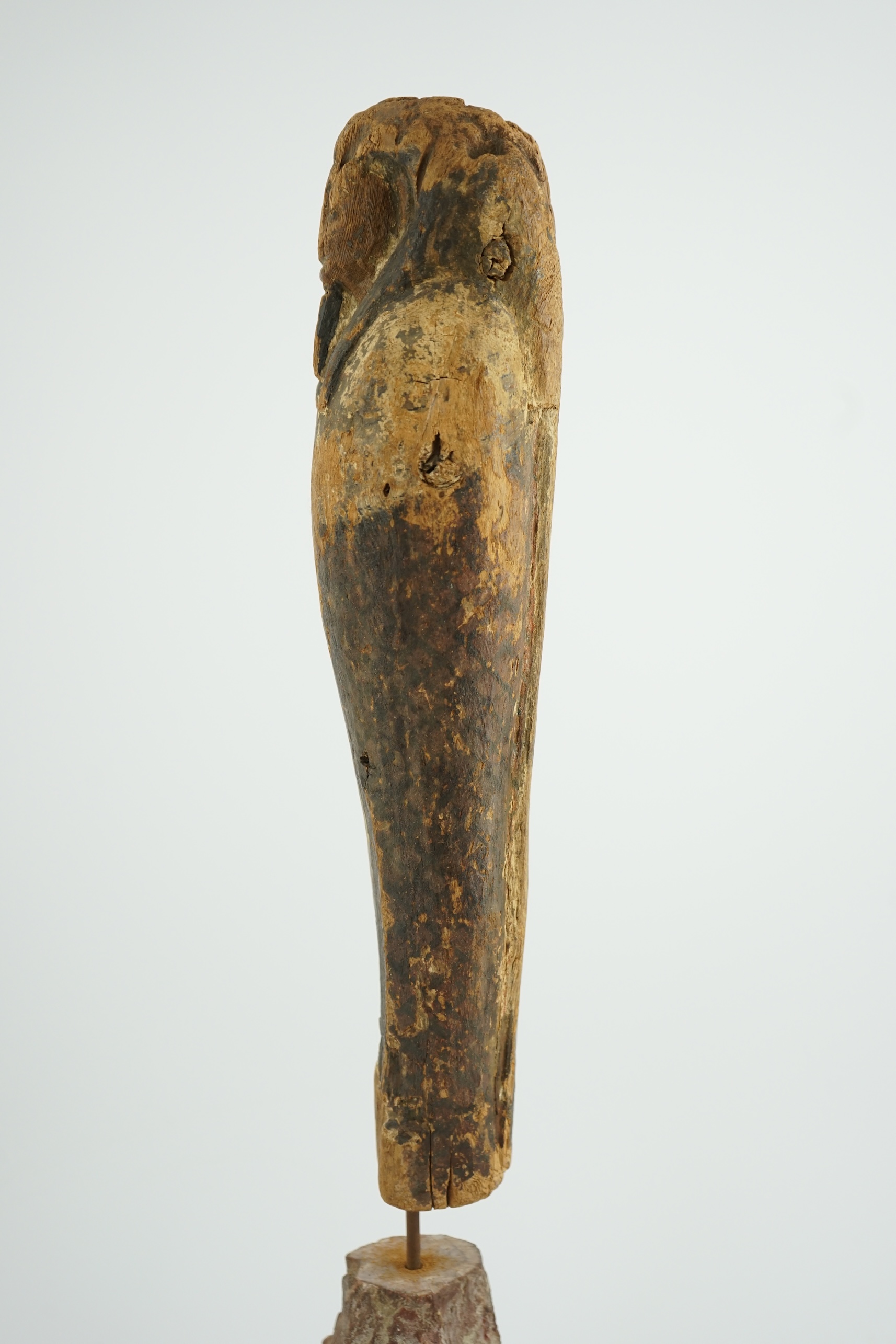 An Ancient Egyptian miniature wood statuette of Ptah-Sokar-Osiris, probably late Kingdom